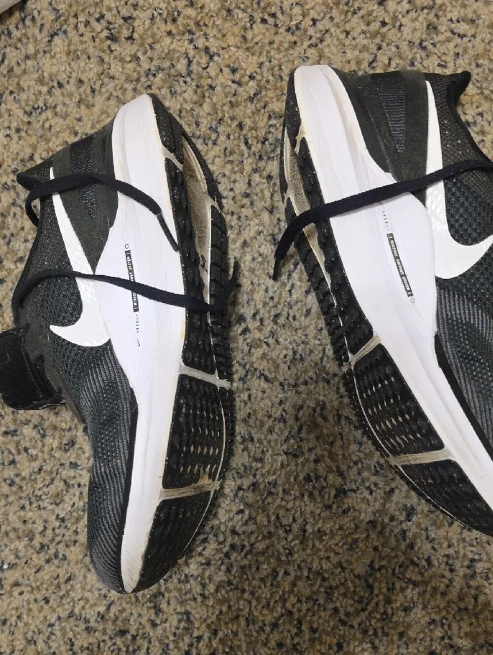 Nike Black and White Athletic Sneakers with Orange Accent